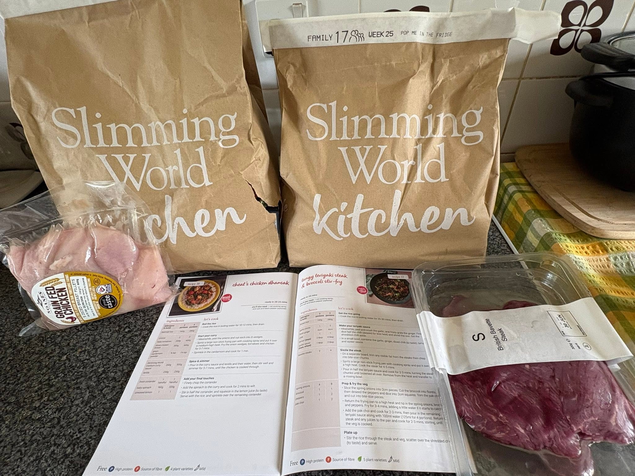 Slimming World recipe cards and fresh ingredients
